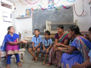 Patashala students and teachers taking part in a workshop. 